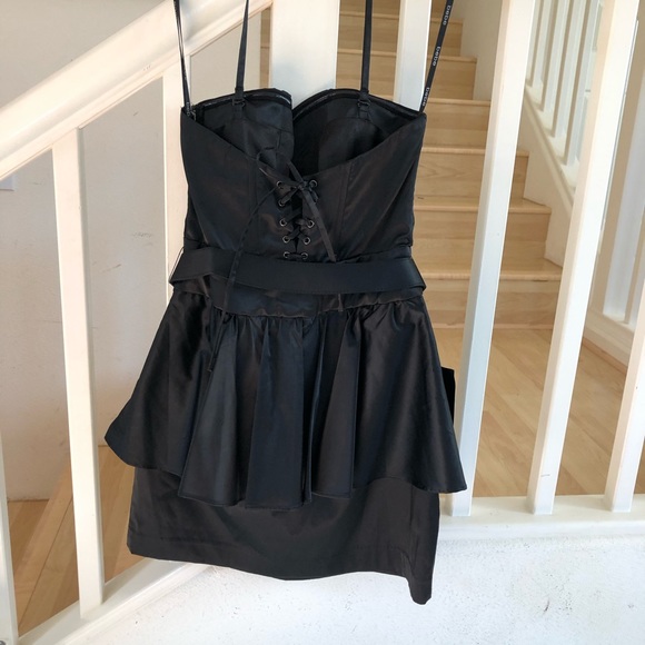 bebe Dresses & Skirts - Bebe black Cateu peplum dress halter style